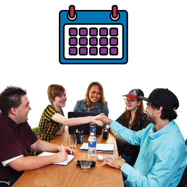 5 people in a meeting with a calendar next to them