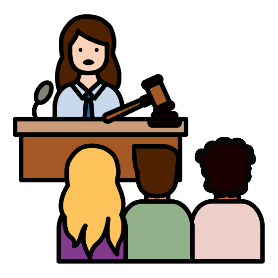 A woman standing behind a bench with a gavel on it, like in a court. There are people sitting in the audience