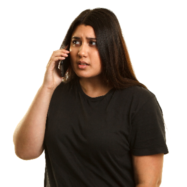 A woman looking worried and talking on the phone