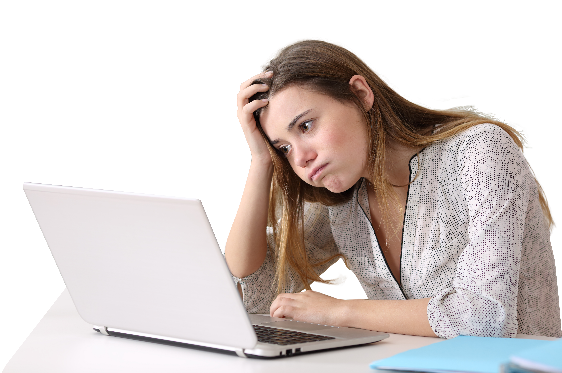 A woman looking at a computer. She is upset