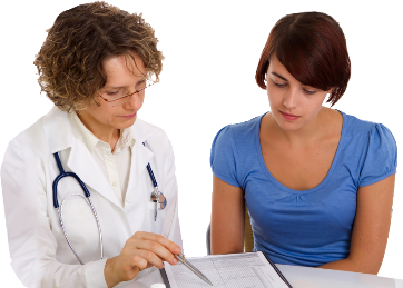 A woman and a doctor reading a document together