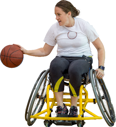 A woman in a wheelchair playing basketball