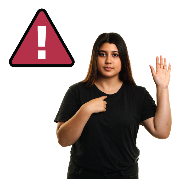 Image of a woman holding her hand up alongside a warning sign