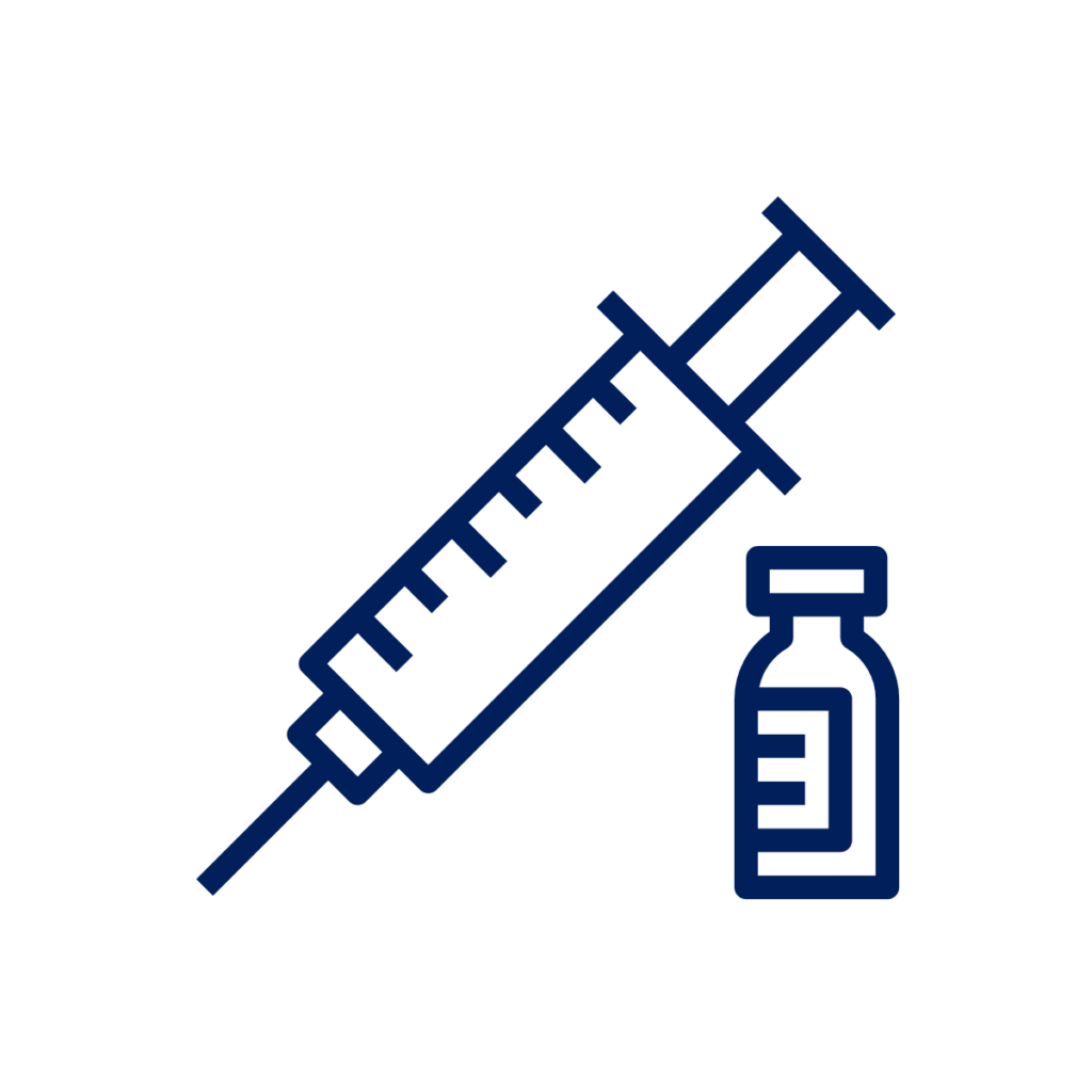 a syringe and vaccine bottle